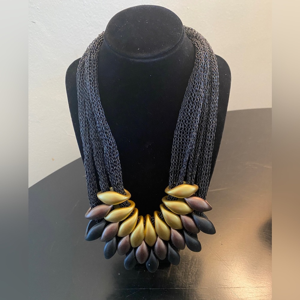 19” black mesh necklace with gold, black, bronze beads.